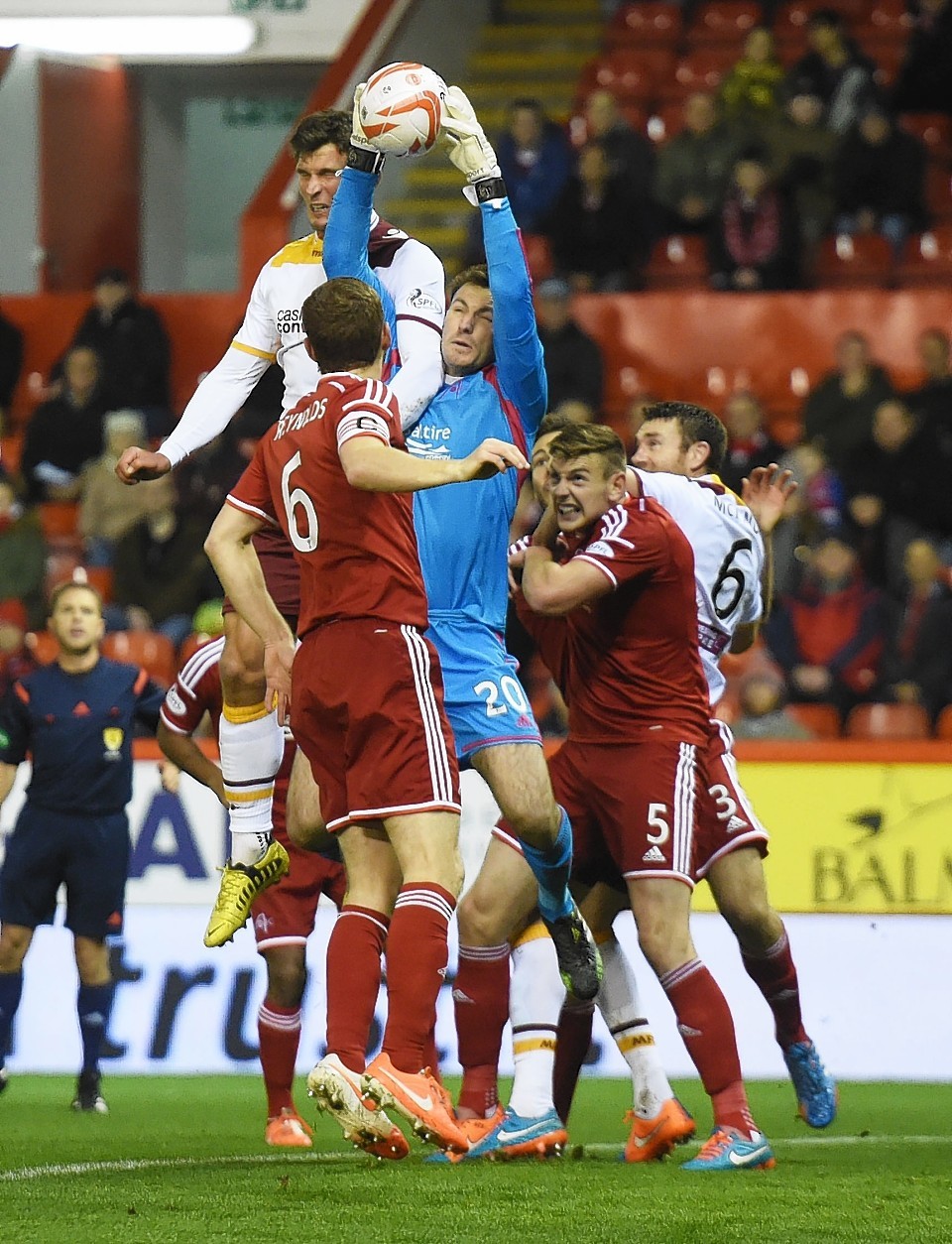 Scott Brown and John Sutton challenge for the ball