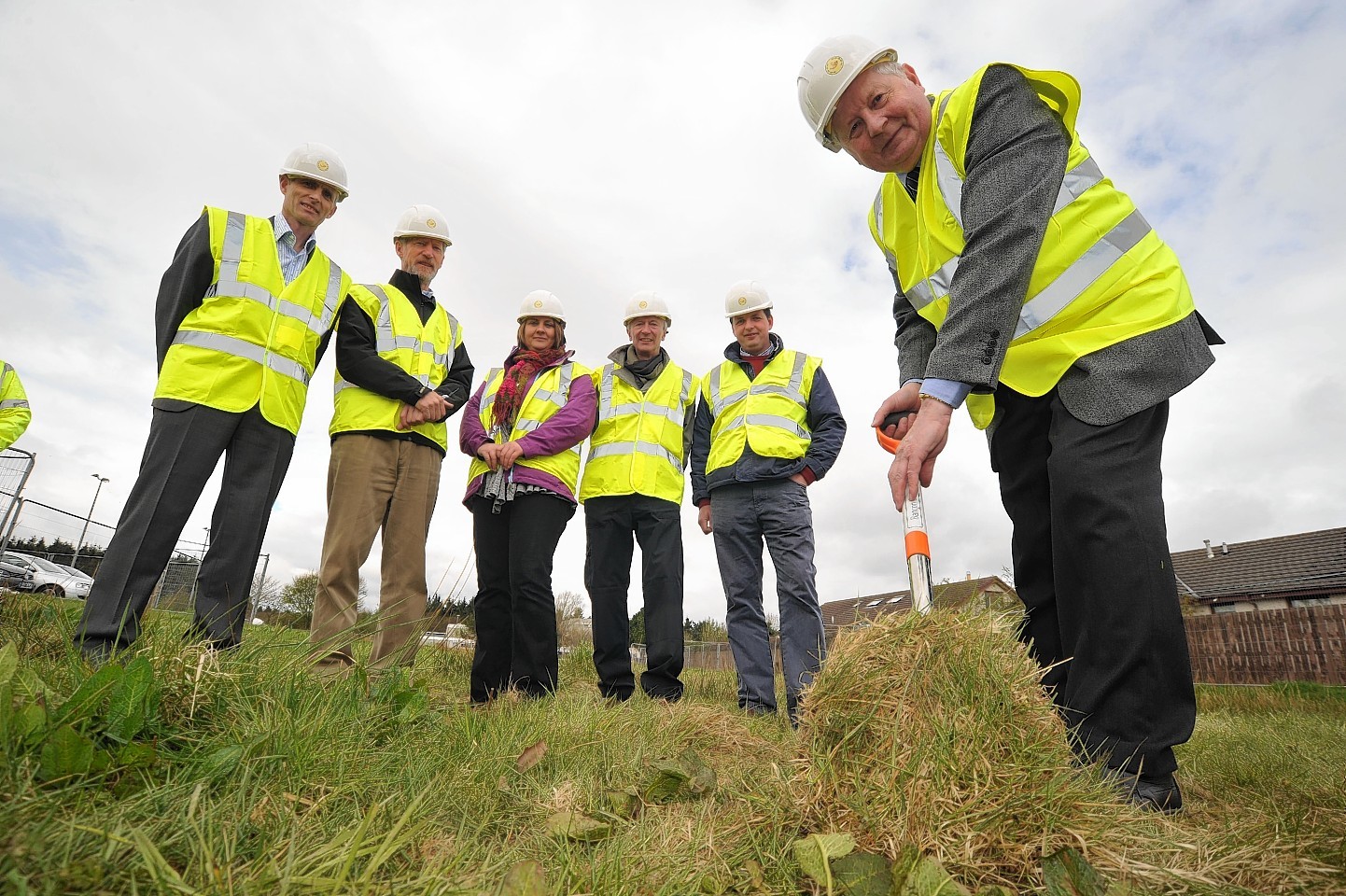 The cutting of the turf at the start of the project back in 2013