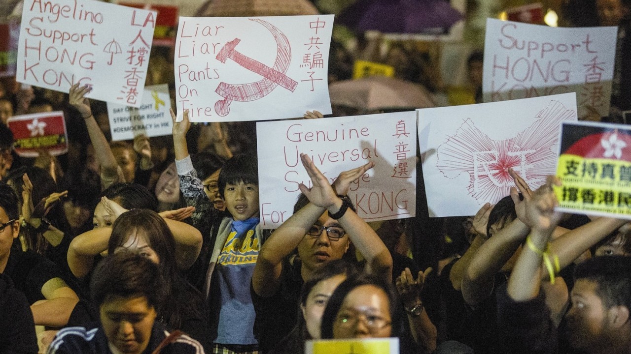 Hundreds of demonstrators at Grand Park downtown Los Angeles to show their support for the pro-democracy protesters in Hong Kong that have been dubbed the "umbrella revolution", on Wednesday Oct. 1, 2014 in Los Angeles