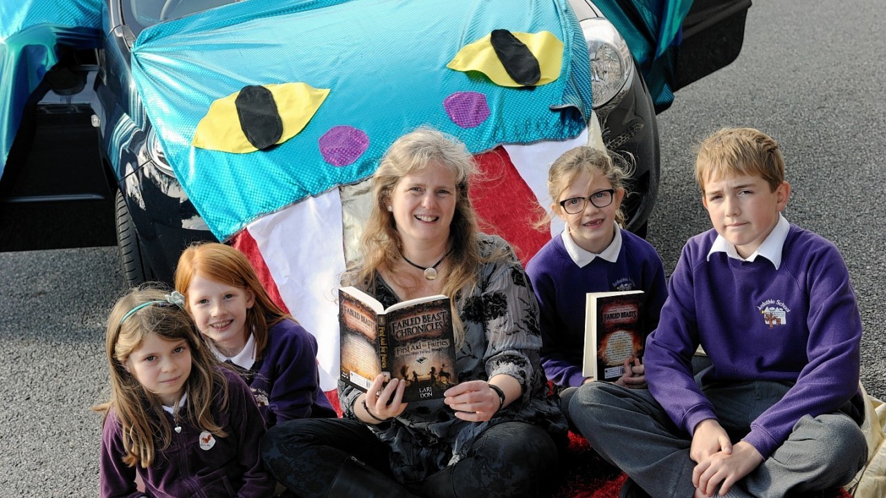 Award winning children's author Lori Don, originally from Dufftown, is on a national book tour visiting schools with her dragon car