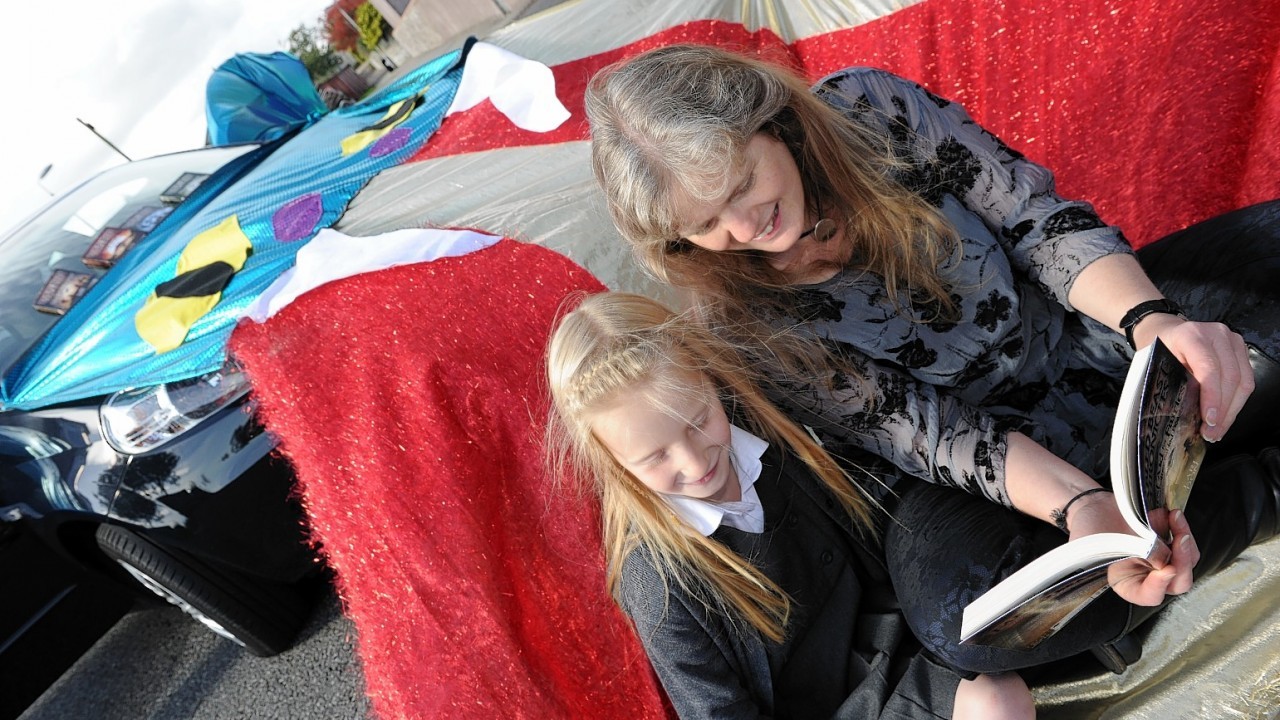 Award winning children's author Lori Don, originally from Dufftown, is on a national book tour visiting schools with her dragon car