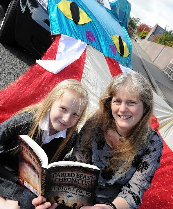 Award winning children's author Lori Don, originally from Dufftown, is on a national book tour visiting schools with her dragon car