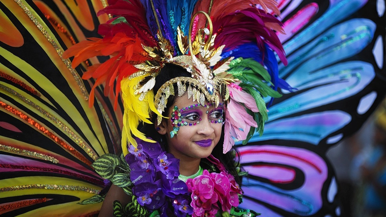 Jazmeen De Gannes dances for the judges at the Miami Broward Junior Carnival, Sunday, Oct. 5, 2014 in Lauderhill, Florida