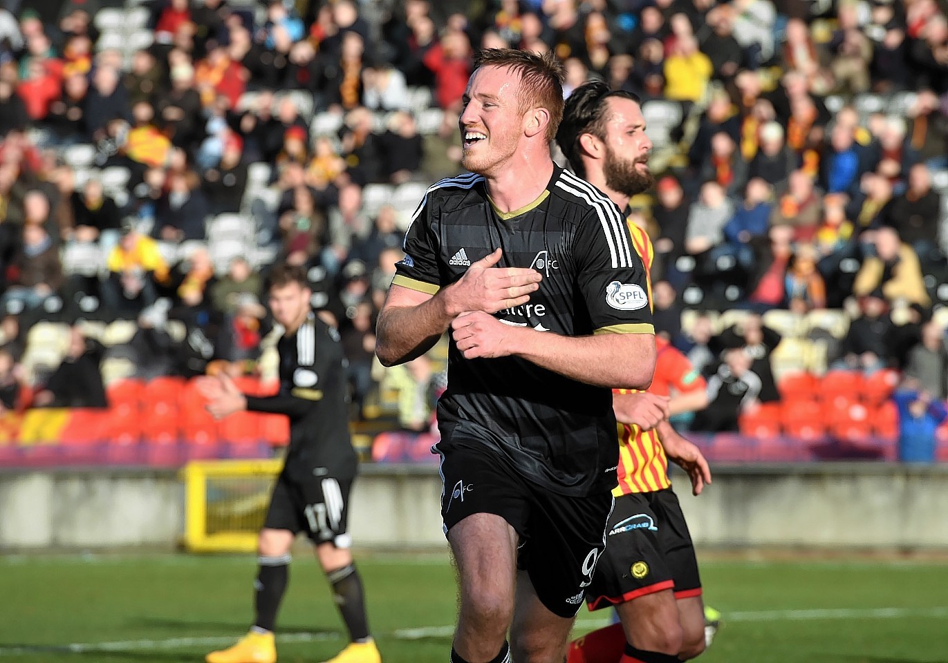 Adam Rooney heads narrowly wide.