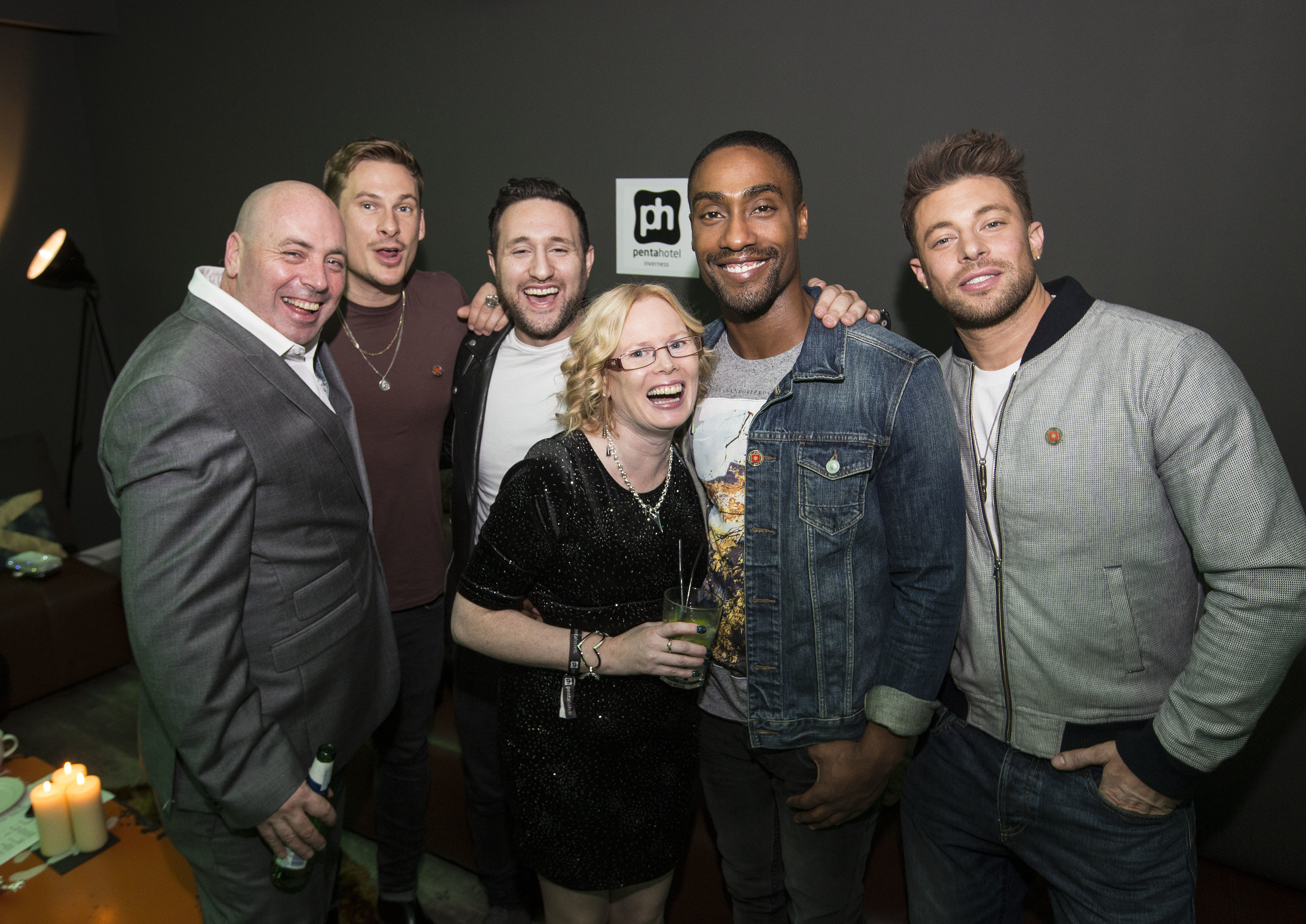 Competition winners Mark and Yvonne Banks with Boy Band Blue