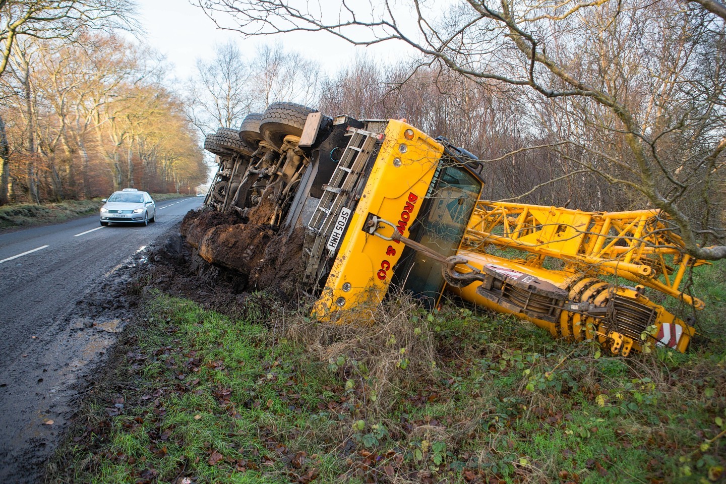 Fortunately nobody was injured when the crane toppled off the road