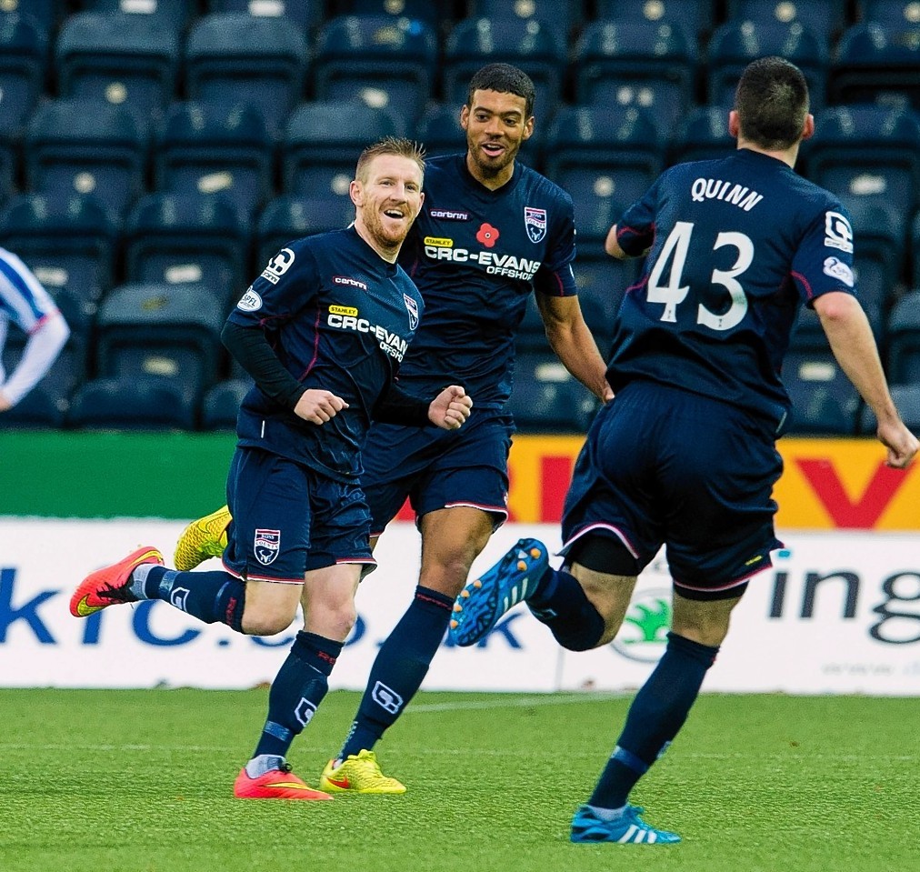 Michael Gardyne celebrates his goal 