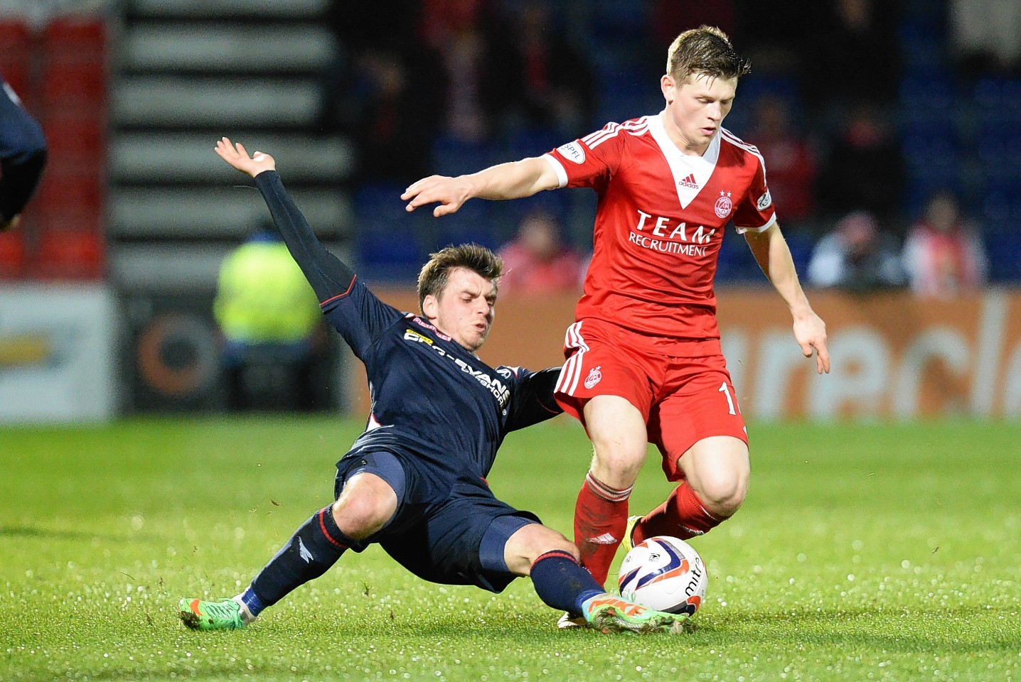 Graham Carey tackles Aberdeen's Cammy Smith
