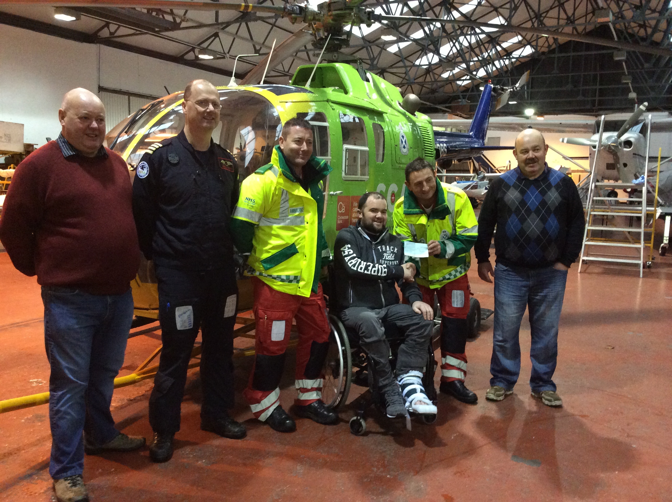 Grant Morrison with the men from Scotland's Air Ambulance Charity who flew him to ARI after his accident