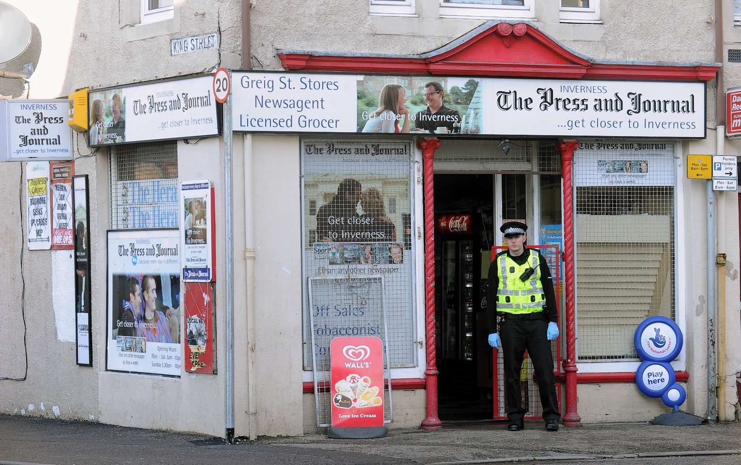 Police outside Greig Street Stores in Inverness