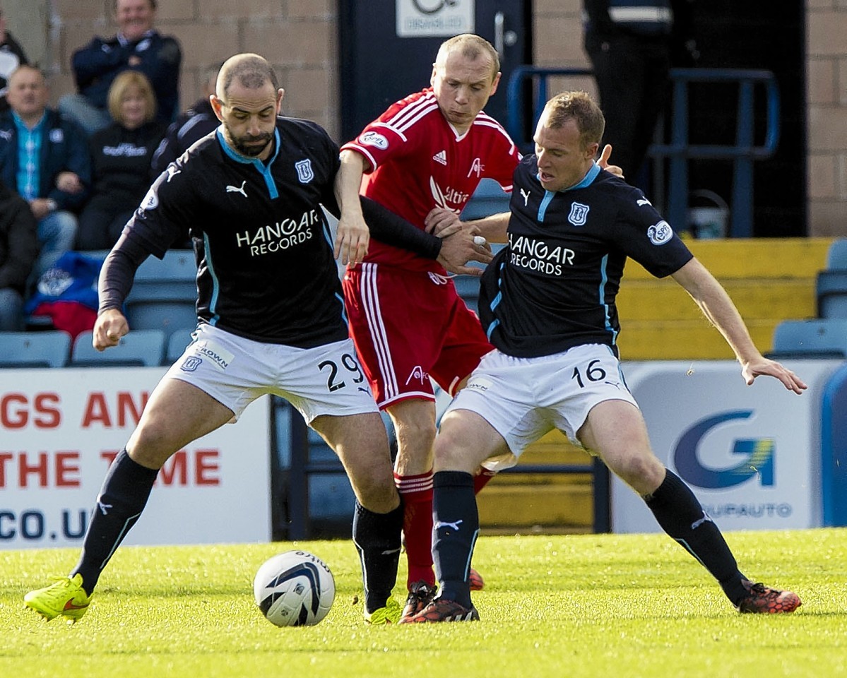 Willo Flood, up against Dundee duo Gary Harkins and David Clarkson, will miss tomorrow's game. 