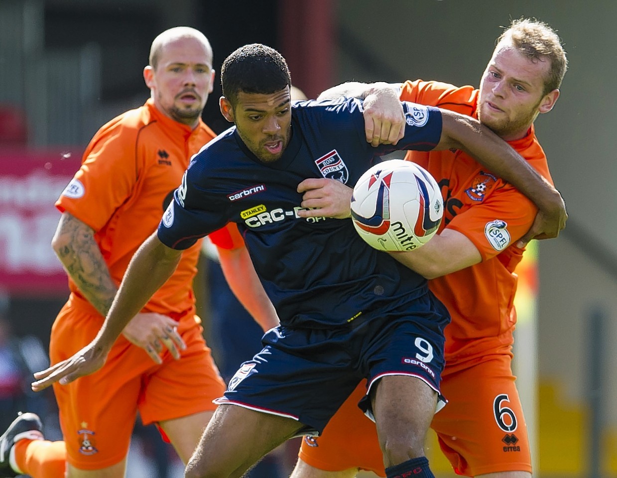 Staggies striker Jake Jervis up against Kilmarnock's Mark Connolly