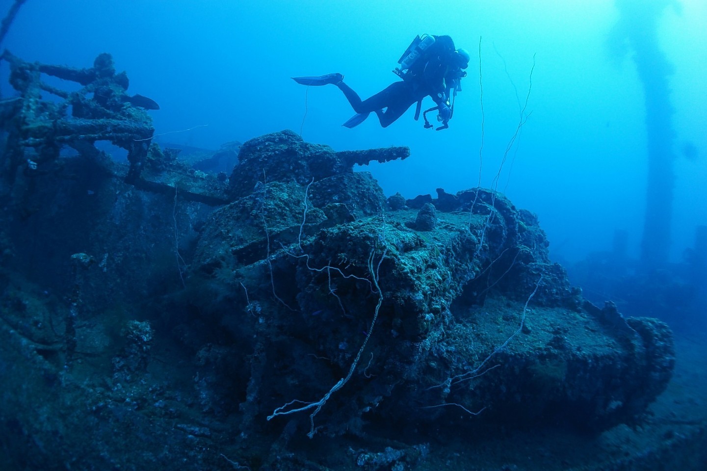 The divers survey the Japanese shipwrecks