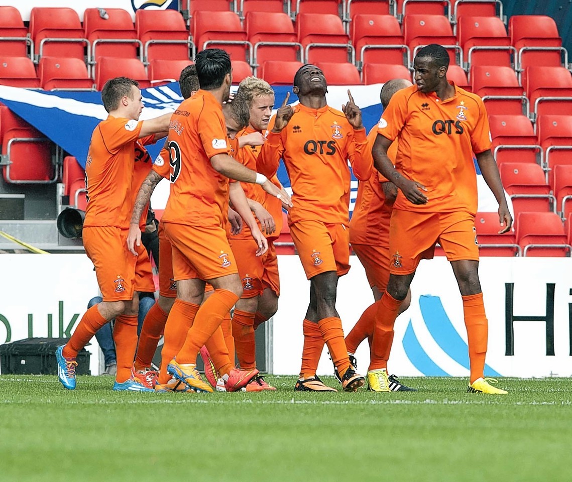 Kilmarnock players celebrate Tope Obadeyi's winner the last time the team's met