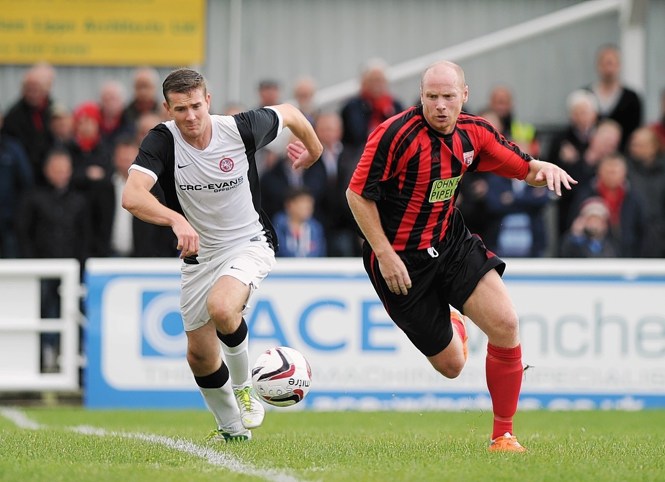 Martin Bavidge, left, in action for Inverurie Locos. Image: DC Thomson