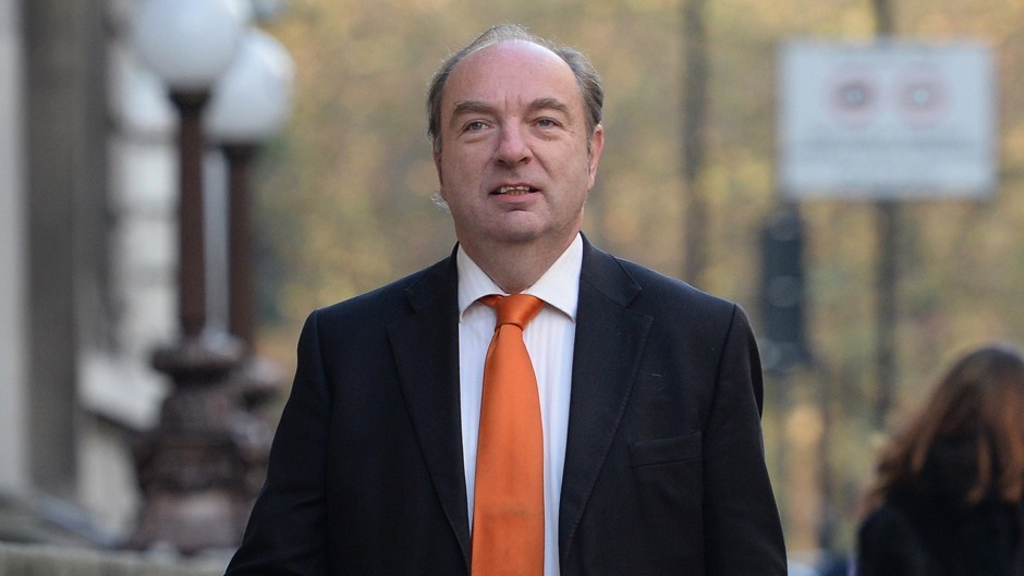 Former Home Office minister Norman Baker arrives at Liberal Democrat offices in Westminster