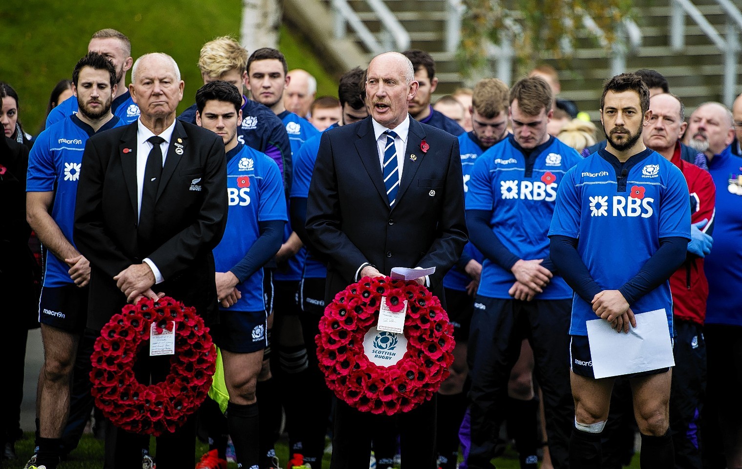 New Zealand Rugby President Ian MacRae, SRU President Iain Rankin and Scotland Captain Greig Laidlaw pay their respects to the fallen British soldiers next to War Memorial at Murrayfield.