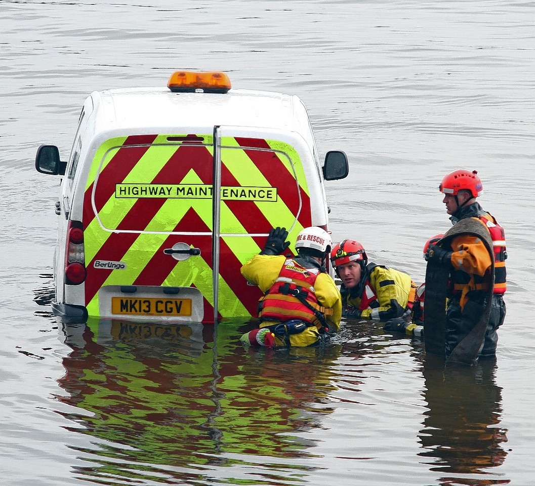 The van ended up in the water.