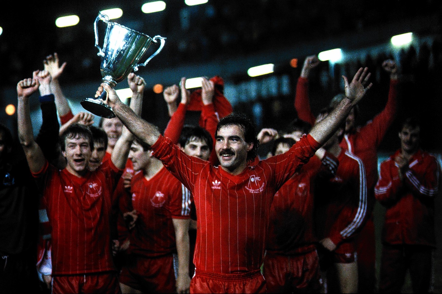 Willie Miller holds the Cup Winners Cup aloft