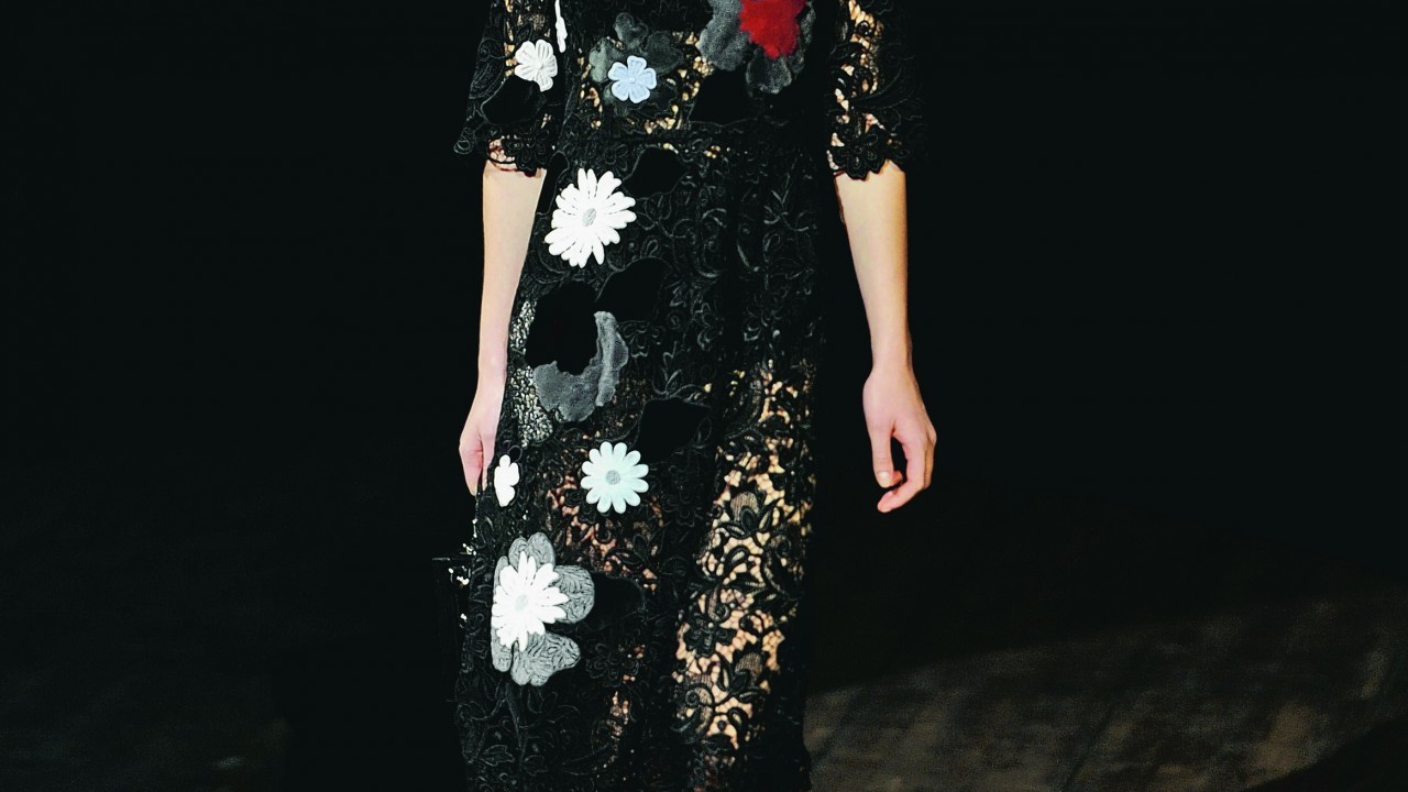 a model wearing Dolce & Gabbana womens Fall-Winter 2014-15 collection, part of the Milan Fashion Week.