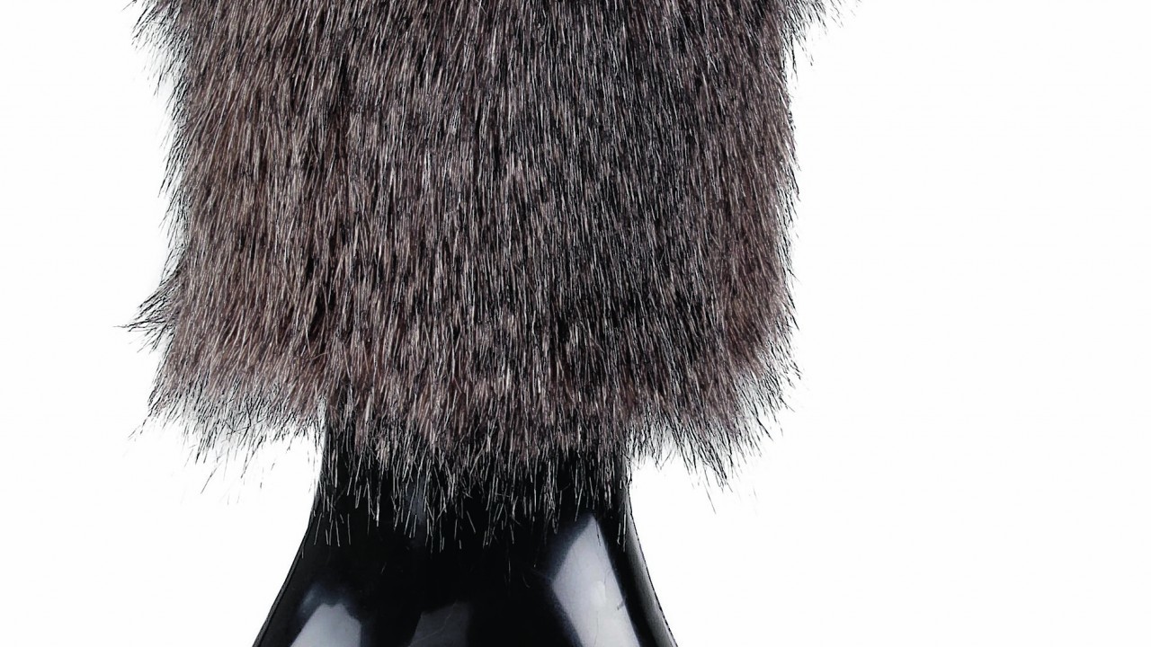 Dents soft short tipped faux fur boot topper with cosy and comfortable knit sleeve. Available in black or chocolate, £24.  www.dents.co.uk