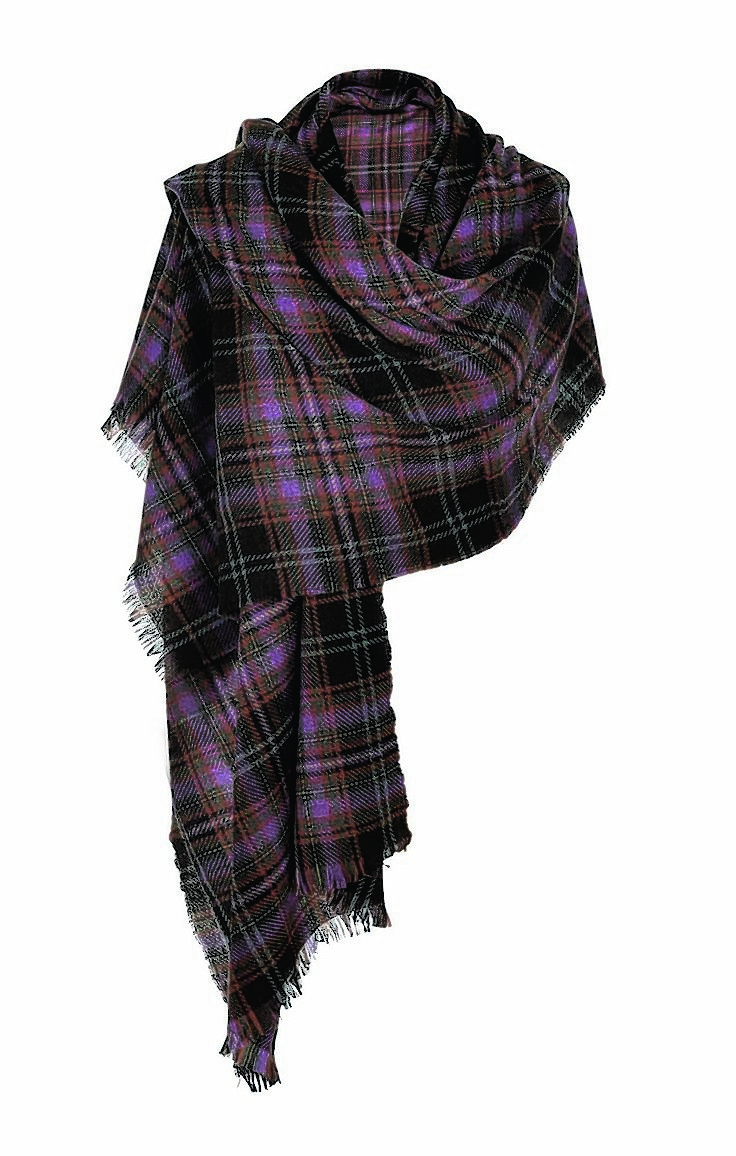 Wrap up with the Really Wild Clothing Company and their luxurious Cashmere mix wool wrap in a stunning purple and heather check tartan. Adds warmth and style to any outfit. Also available in alternate colour ways. £135 from Country Ways, 115 Holburn Street, Aberdeen