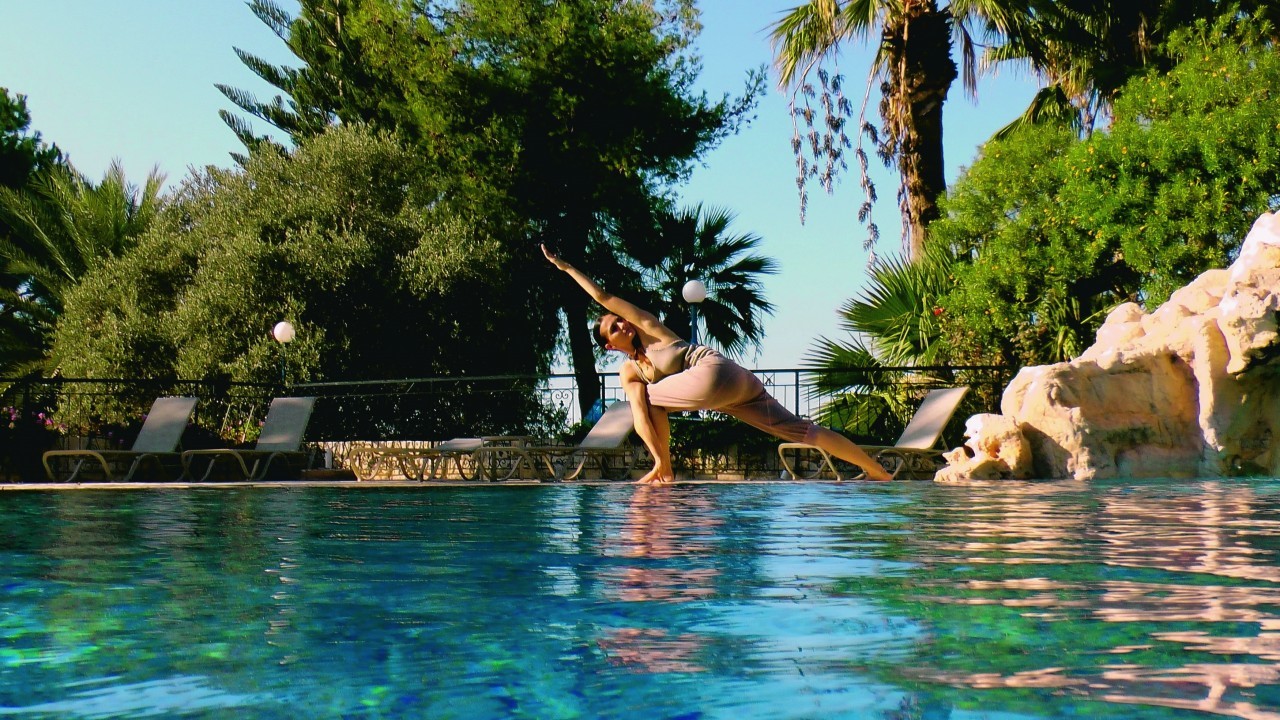 Yoga practice at Fontana Pool at Zening Resort in Latchi