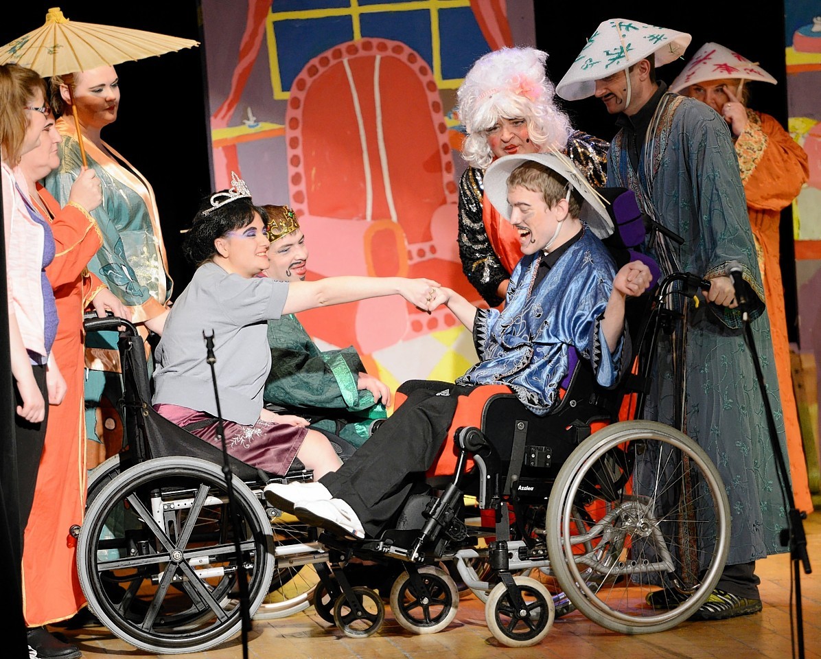 Prince Jasmine (Natasha Brown) rejects the hand of suitor, Lord of Camanachd Crescent (Darren Harkins) during highland Disability Sport Lochaber's pantomime.