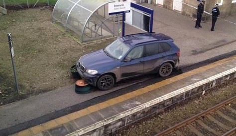 One of the cars involved was left crashed at Inverurie Train Station. 