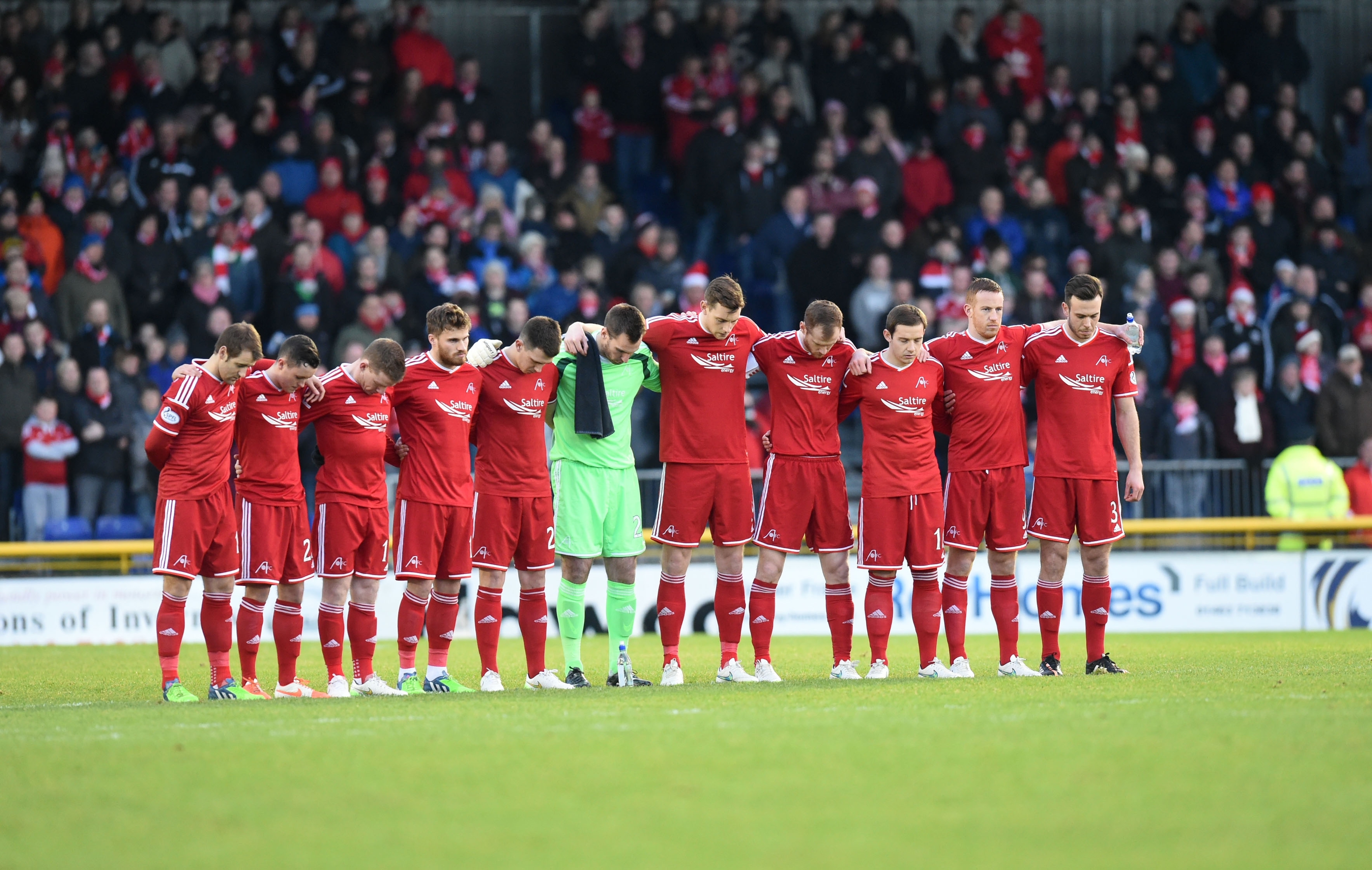 The two teams and supporters impeccably observed a minute silence in memory of those killed at George Square ahead of today's match.