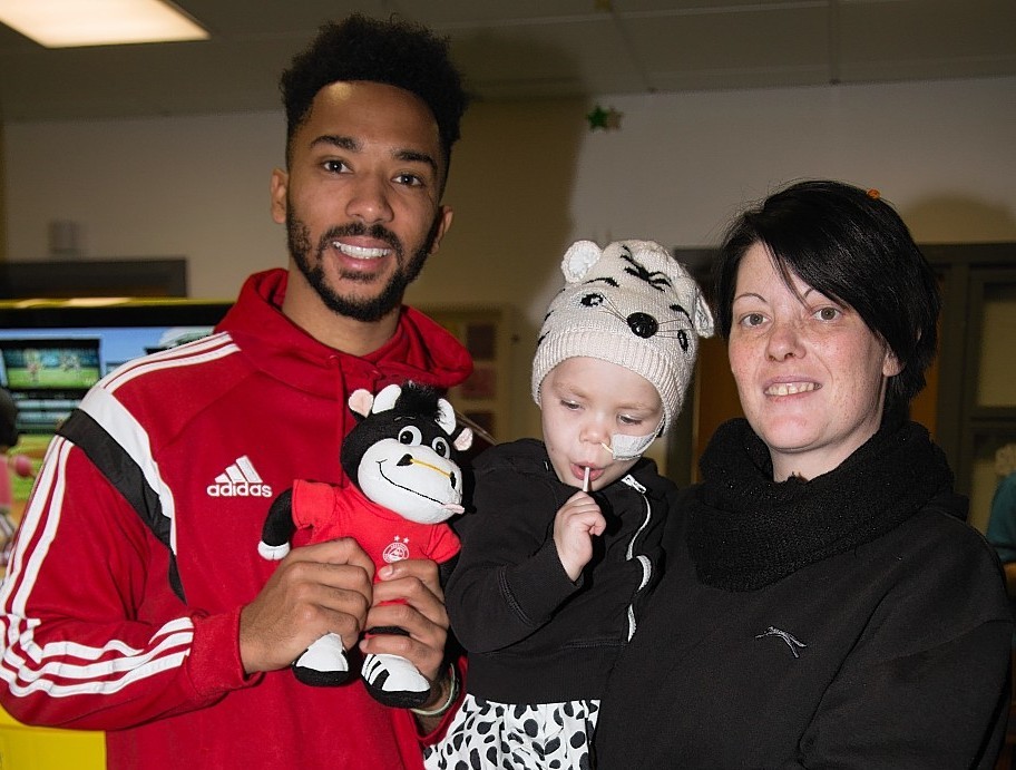 Eileidh Paterson with her mum and Aberdeen footballer Shay Logan