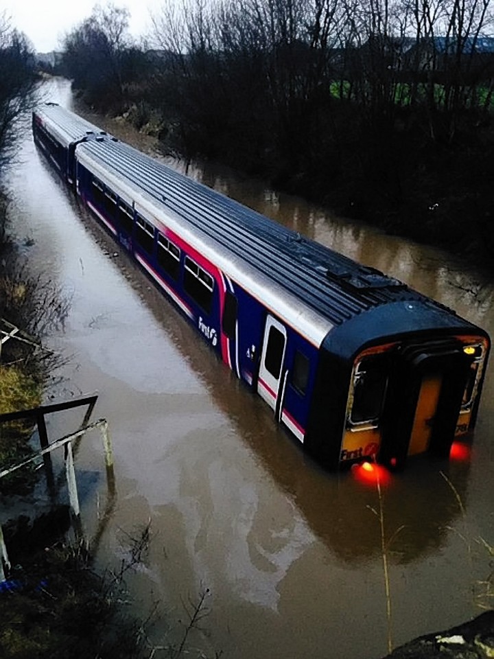 The Glasgow to Carlisle train became stuck in flood water in Ayrshire