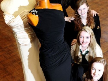 Gordon School pupils Lauren Dow, Rebecca Curtis, Ciara Ennis and Kirstie Gordon with the Jane McDonald dresses