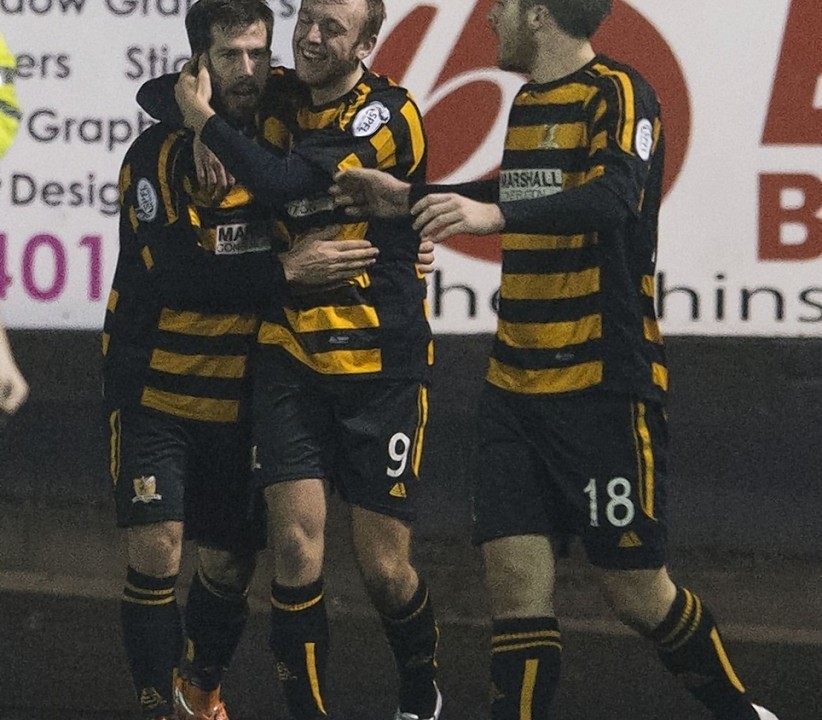 Spence celebrates his second goal that secured Alloa's place in the final.
