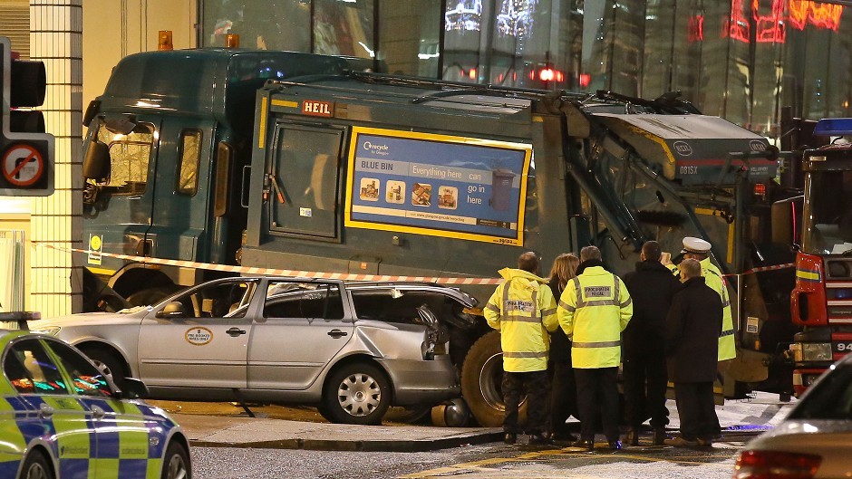 Police have begun the investigation into what caused a bin lorry to career along a pavement crowded with Christmas shoppers in the centre of Glasgow