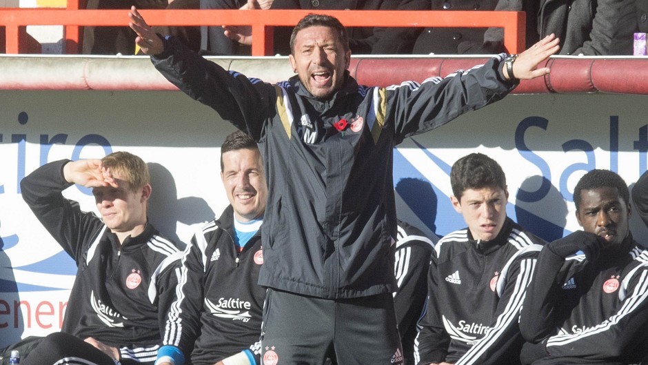 Derek McInnes, pictured, could lead Aberdeen to the title says ex-Don Dougie Bell