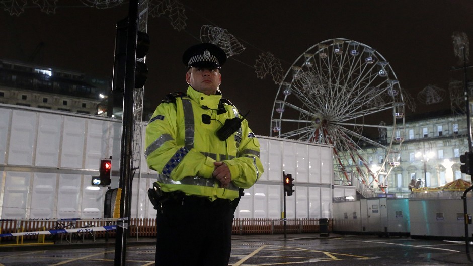 Police at the scene in George Square where a bin lorry crashed into a group of pedestrians