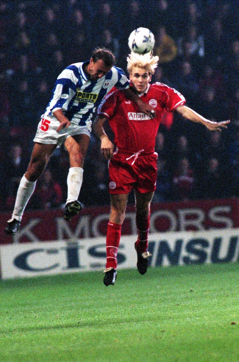 We stumbled across this beauty of Russell Anderson taking on Kilmarnock's Jerome Vareille in 1998 but the Dons captain will miss out today