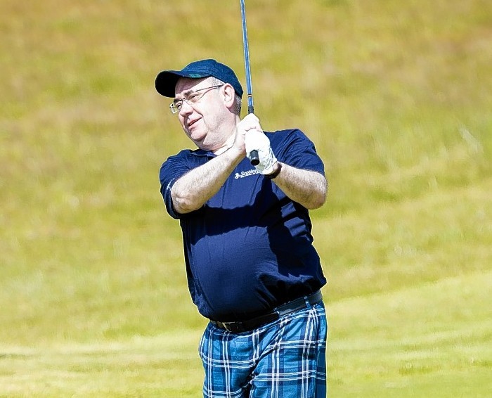 Alex Salmond playing golf