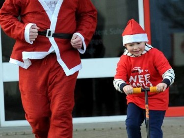 'Santa' Simon Kidd and 'Wee Santa' Ryan Crockett