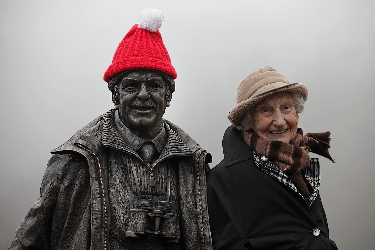 Countryside legend Tom Weir is honoured with a statue at Balmaha, Loch Lomond, unveiled by his wife Rhona