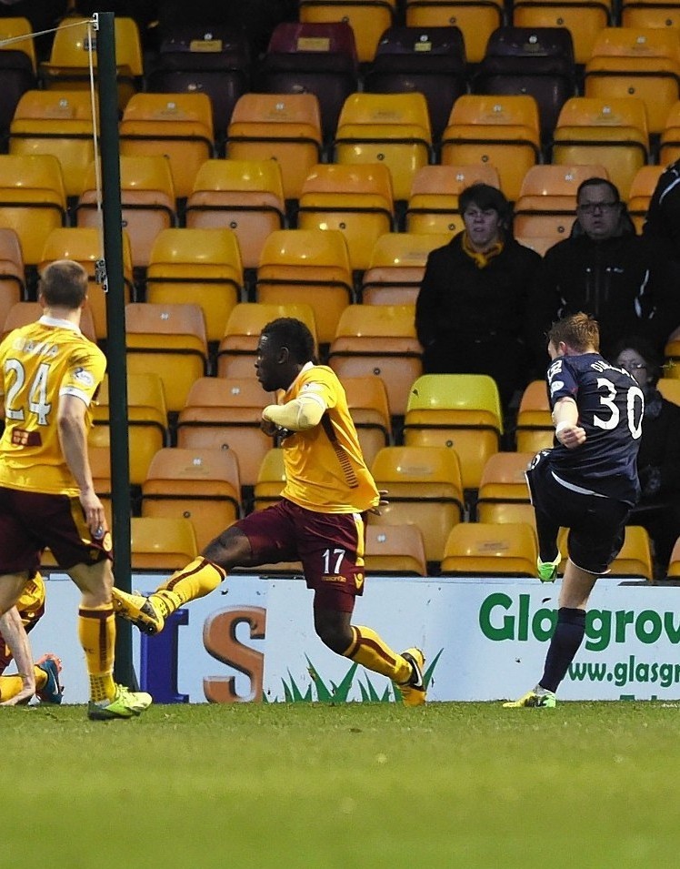 Tony Dingwall fires home his first goal, against Motherwell