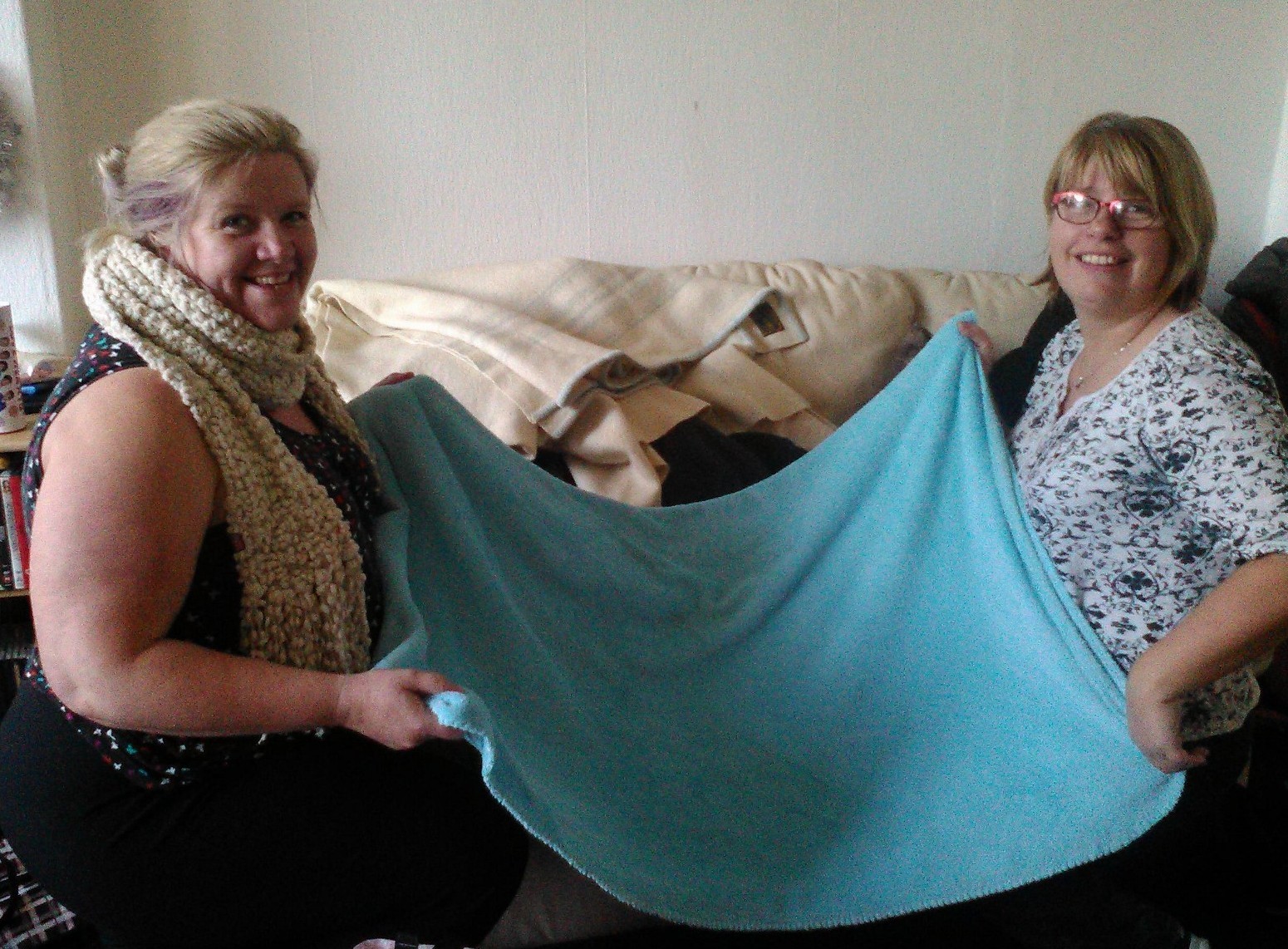Margaret McEwan (left) and her friend Mairi MacGillivray, both of Ballachulish, with some of the blankets they have collected.
