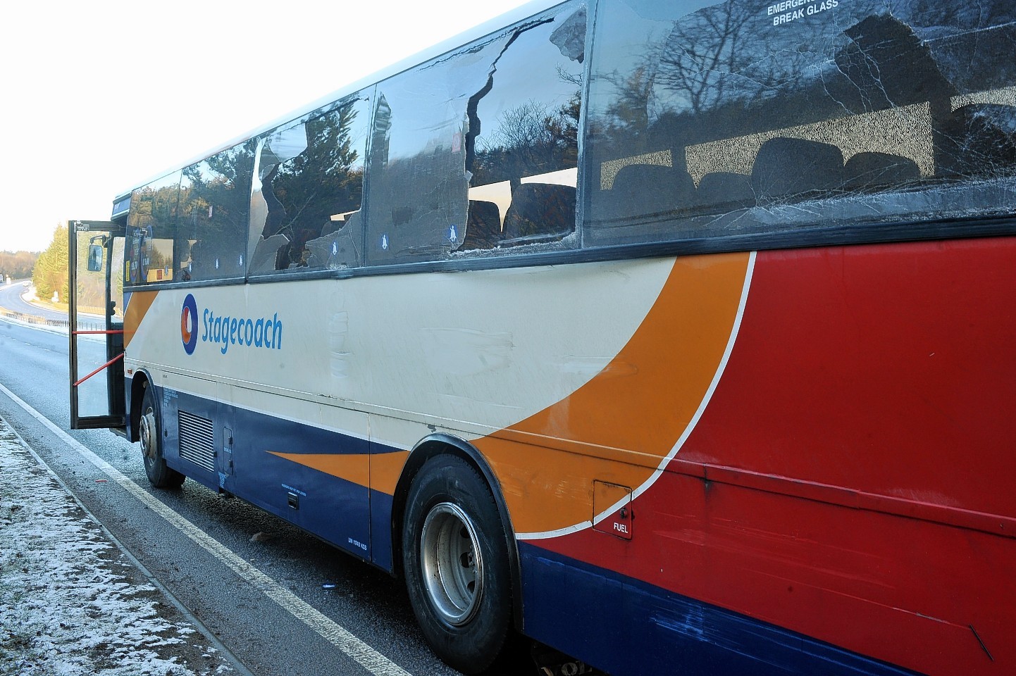 The bus was damaged after colliding with a lorry on the A9