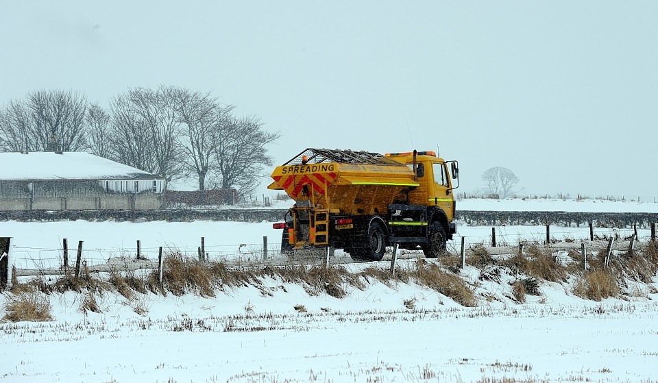 A gritter patrolling the roads