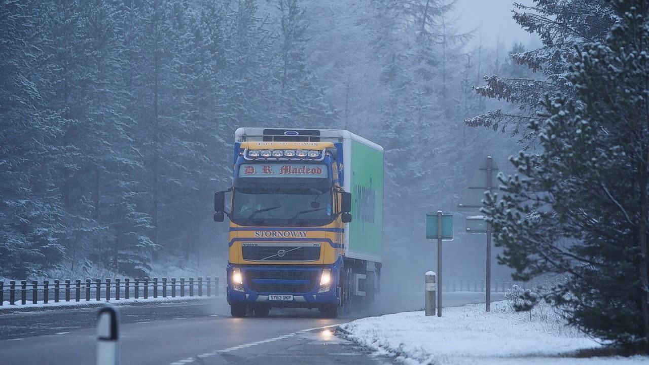 A lorry heads south through snow on the A9. Picture: Paul Campbell