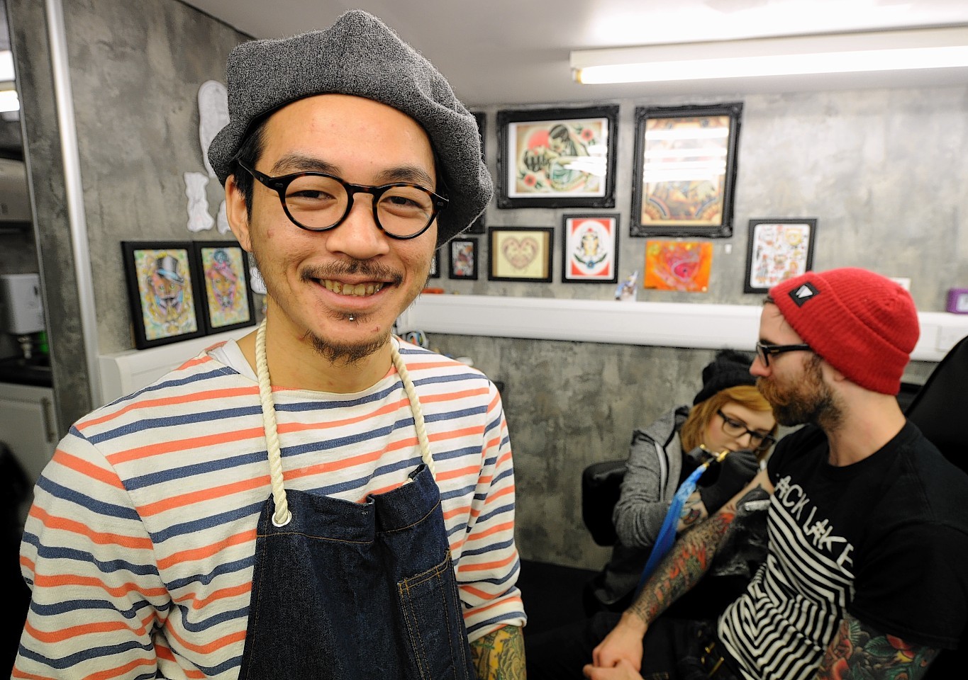 Japanese tattoo artist Peco joins Rebel Ink for a week. Photo by Jim Irvine.