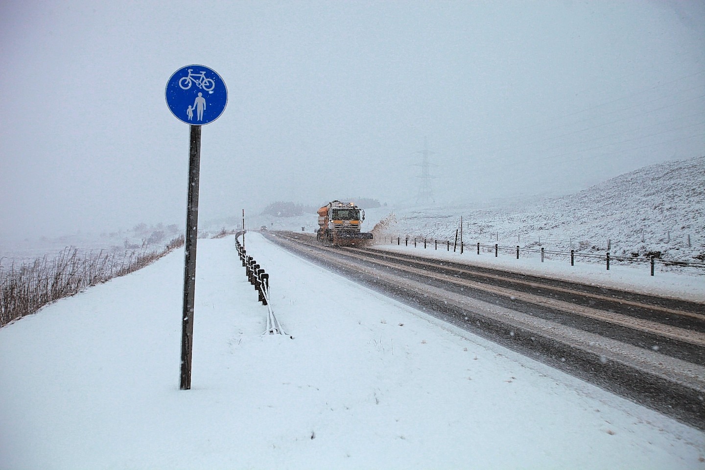 Snow lines the A9 