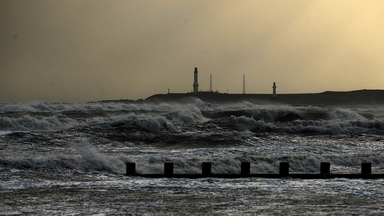Large areas of Scotland saw sleet and snow today, Aberdeen saw wind and waves