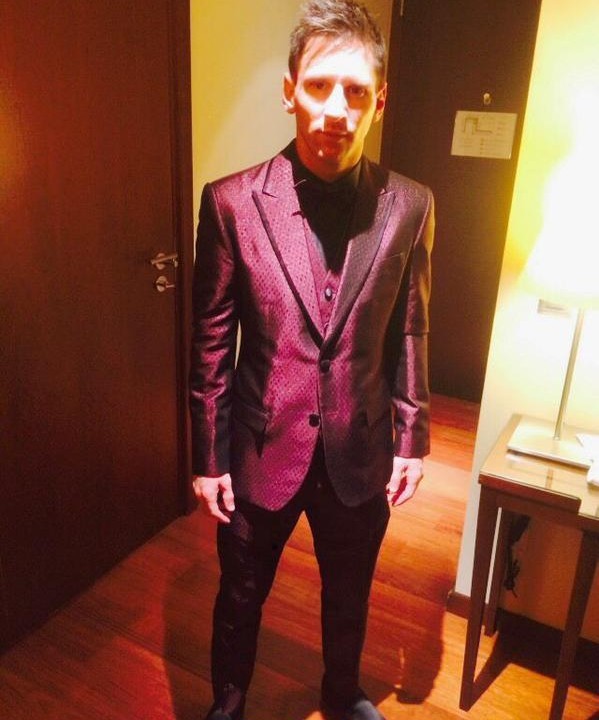 Lionel Messi and his purple suit
